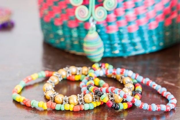 A close-up shot of various affordable accessories, including colorful beaded bracelets, a set of stackable rings, and a patterned silk scarf, arranged on a neutral background to highlight their individual details.