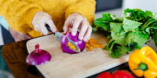 A close-up shot of a person preparing a healthy meal with fresh, colorful vegetables and herbs, highlighting the anti-inflammatory ingredients such as ginger, turmeric, and leafy greens.