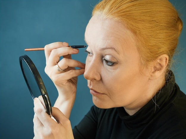 A woman demonstrating how to create the wing of the eyeliner, starting with a thin line extending from the outer corner of the eye and angling upwards.