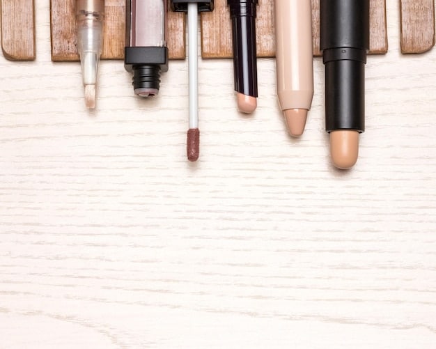 A flat lay of essential makeup products for the no-makeup makeup look. Items include a tinted moisturizer, concealer, cream blush, brow gel, mascara, and a nude lip balm.