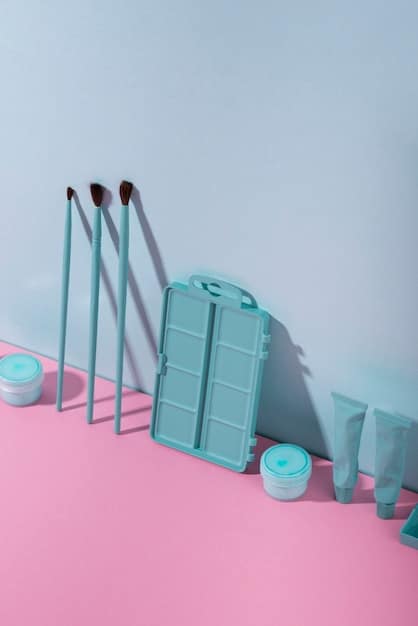 A well-organized makeup table featuring lipsticks in various shades, a lip concealer, a lip brush, and a mirror. The lighting is soft and flattering.