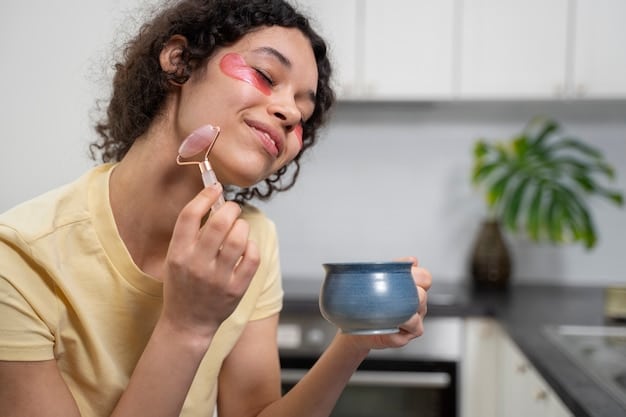 A person demonstrating the blending process of cream contour on their face, using a damp blending sponge.