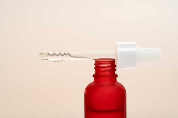 A serum with a dropper applicator, featuring key anti-aging ingredients such as retinol, peptides, and vitamin C. The packaging is sleek and modern, emphasizing the product's advanced formulation.