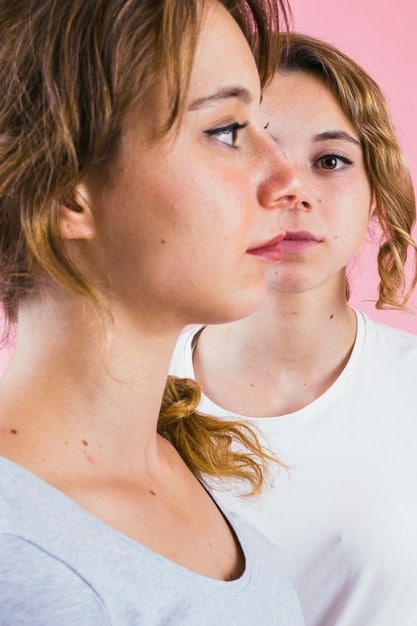 Close-up of different types of acne (whiteheads, blackheads, pustules) on a person's face. Highlight the differences in appearance and severity.