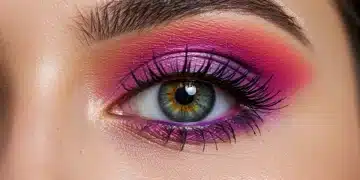 Woman with vibrant, crease-free eyeshadow in a modern makeup look.