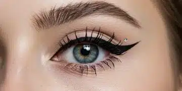 Model's eye with advanced artistic black eyeliner, sharp wing, and floating crease