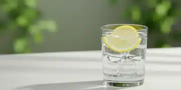 Refreshing glass of water with lemon for 2026 wellness