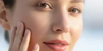 Woman with glowing, hydrated skin in winter, showcasing effective winter skincare.