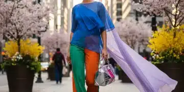 Woman in vibrant spring 2026 fashion outfit on city street